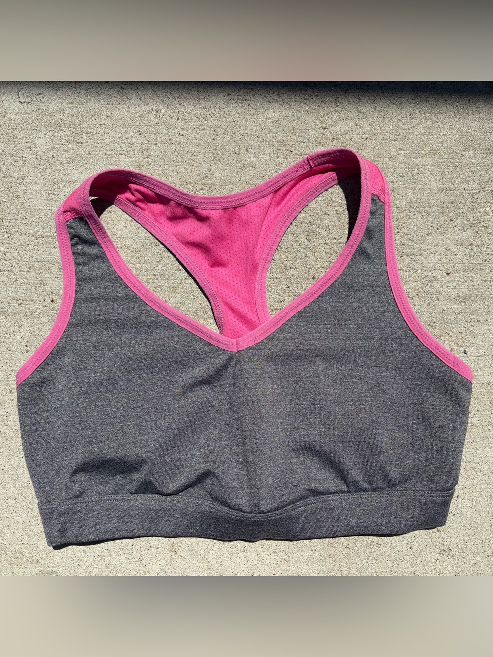 LUCY GREY AND PINK SPORTS BRA